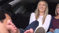 Feet licking in car...