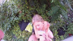 Naughty blonde has a go at fucking a horny dude in the bushes