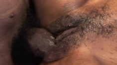 Exciting ebony girl Marie Luv takes a black shaft in her hairy peach