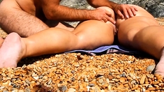 Massage girl pussy and ass at beach